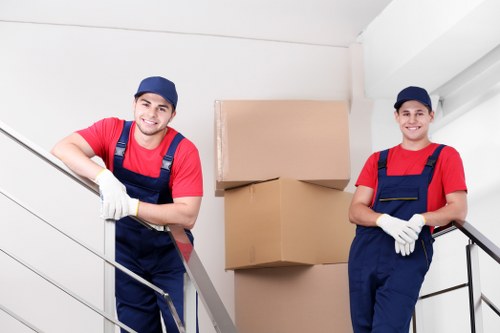 Removal team planning a move in Hammersmith near local flats and busy West London streets