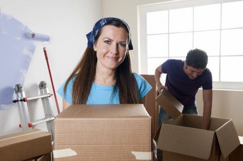 Local movers in Hammersmith organising boxes and furniture for relocation