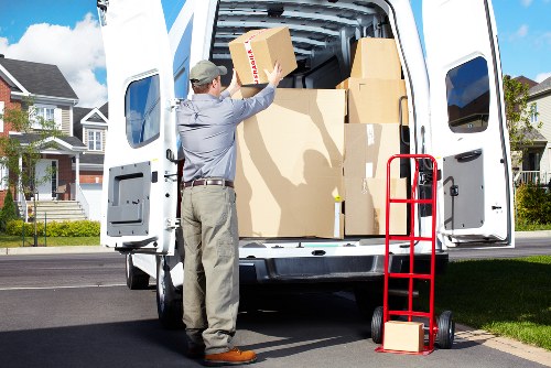 Furniture and boxes being moved with a Hammersmith van service